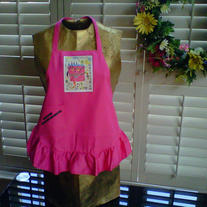 Child's apron featuring Cakenstein