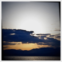 8x8 | Greecian sunset, a cloudy sky.