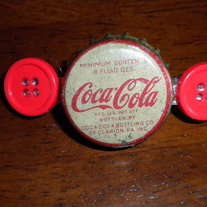 Old white Coca Cola hair clip