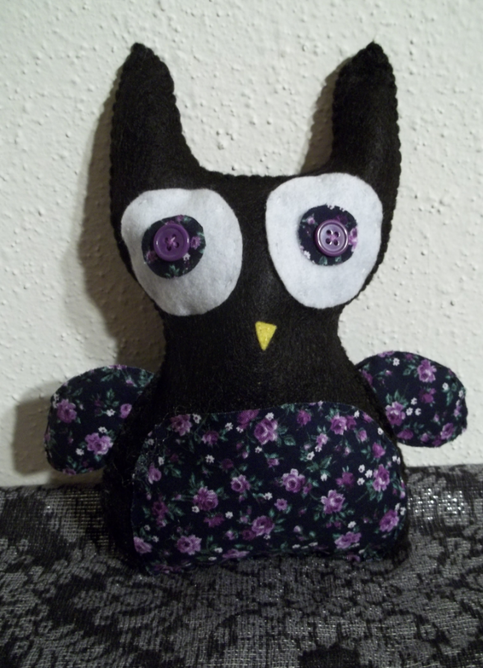 Black floral owl