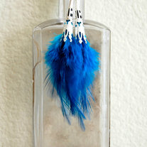 Indigo_20blue_20feather_20earrings_20in_20silver_medium