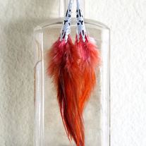 SOLD Atomic Tangerine Feather Earrings