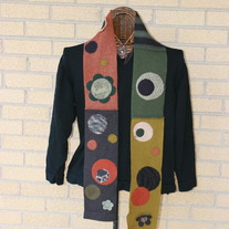 Recycled wool dotty scarf in earthtones