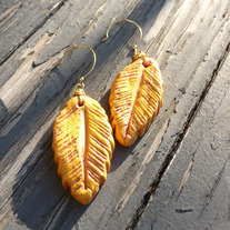 FLOAT ON // feather earrings _ mustard yellow