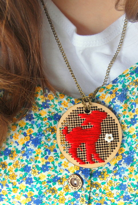 stitchery wooden pendant