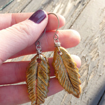 FLOAT ON // feather earrings _ mustard patina