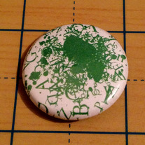 Word Explosion Green typeface 1 inch pinback button