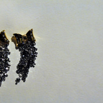 Gold bow earring
