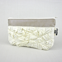 THE CITY CLUTCH IN GOLD & CREME