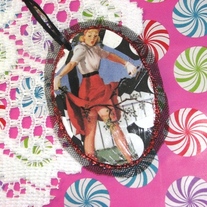 Caught on a Branch Oval Ornament