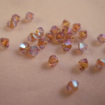 4mm bicone Light Colorado Topaz ABx2