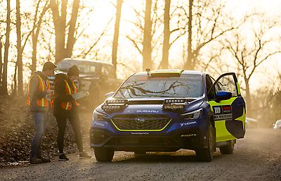 Travis Pastrana and Rhianon Gelsomino check into a time control as the sun sets in Missouri.