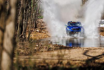 Splash! The #199 Subaru WRX takes to the water on SS7.