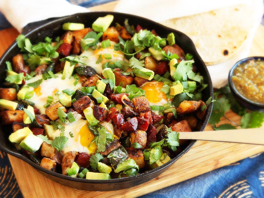 Crispy Potato, Chorizo, and Green Chili Hash With Avocado and Eggs Recipe