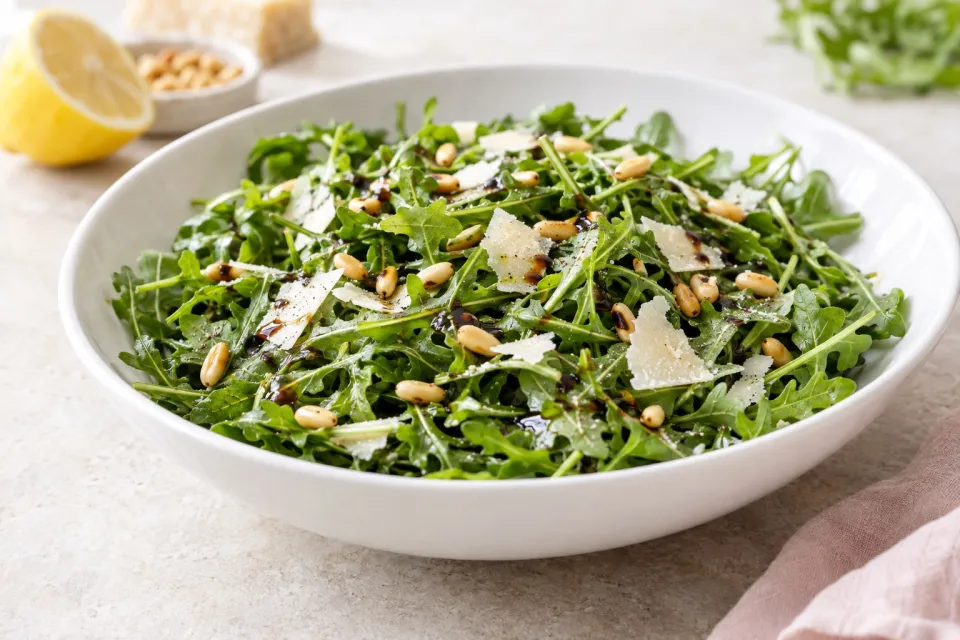 Kalyn's Favorite Baby Arugula Salad with Lemon, Balsamic, Parmesan, and Pine Nuts