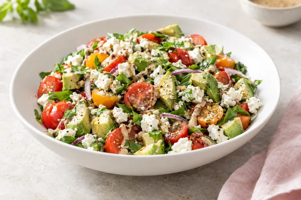 Tomato, Avocado, and Feta Salad with Tahini-Balsamic Vinaigrette