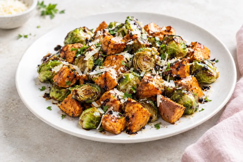Roasted Sweet Potatoes and Brussels Sprouts with Balsamic and Parmesan