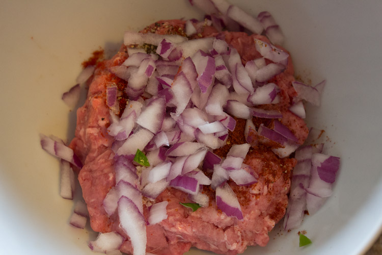 Mixing the burger