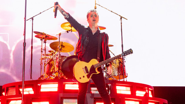 Green Day's been "working recording our record" throughout the year
