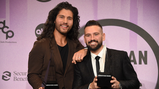 Dan + Shay’s Shay Mooney jokes that his kids are “pretty devastated” about getting a baby brother