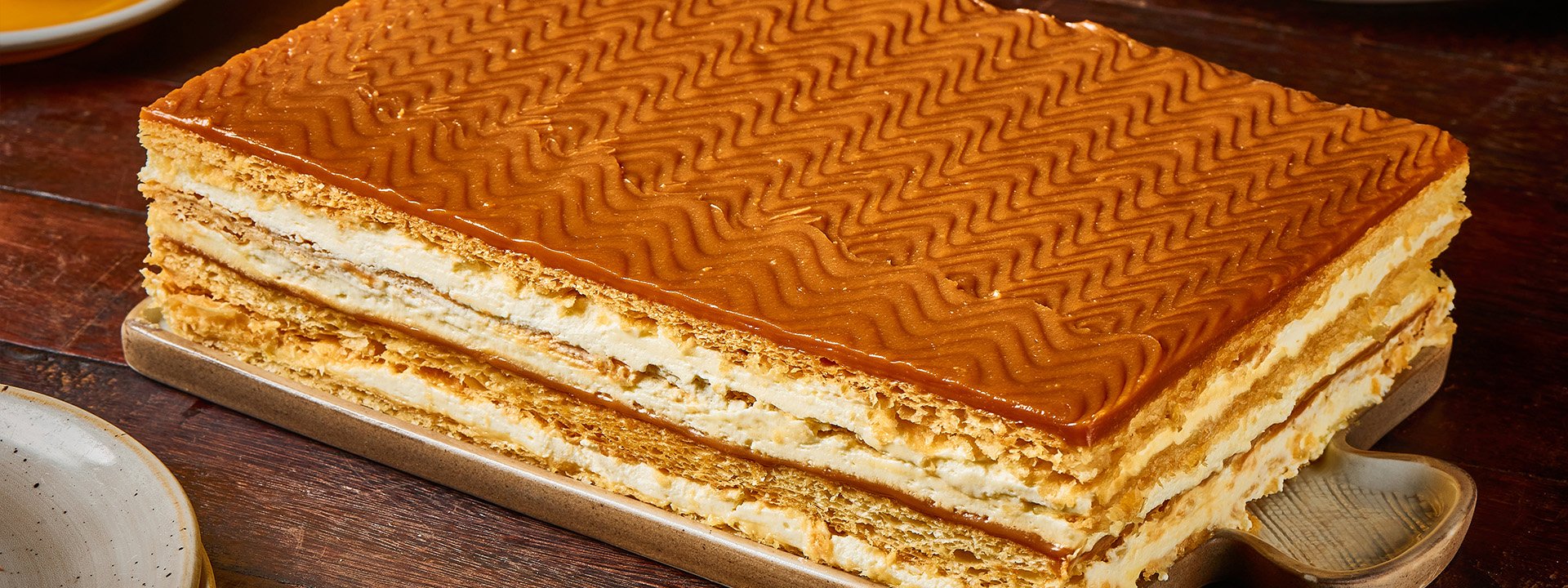 Los postres favoritos de Central Cevichería ahora en tamaño grande, hasta para 10 personas: flan de coco, milhoja de arequipe, pie de guayaba y torta tres leches.