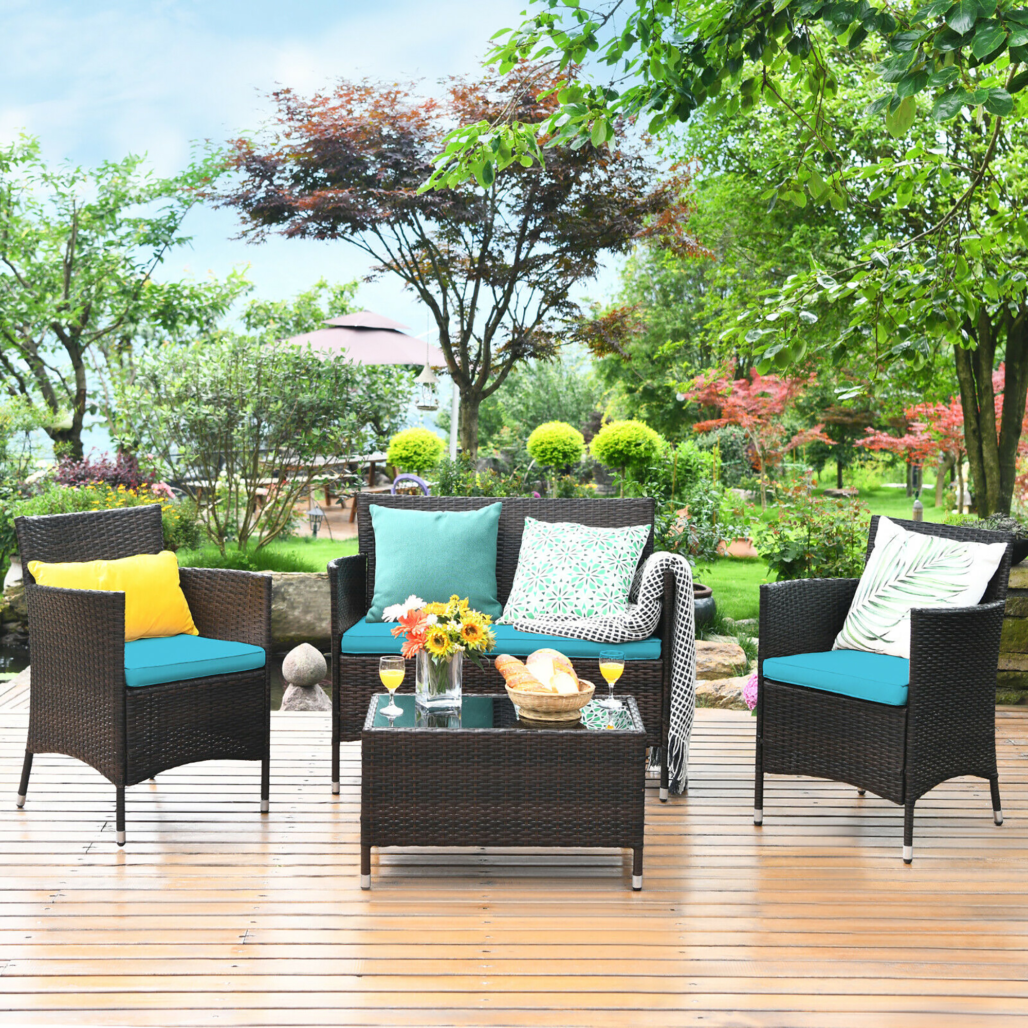 Costway 4-Piece Rattan Patio Furniture Set Cushioned Sofa Chair Coffee Table