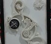 clock design in plaster