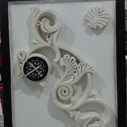 clock design in plaster