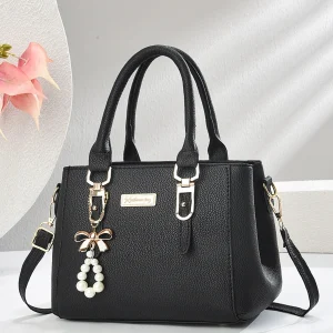 Fashionable women's black handbag, fur ball accessories suitable for casual occasions, trendy suitable for daily use