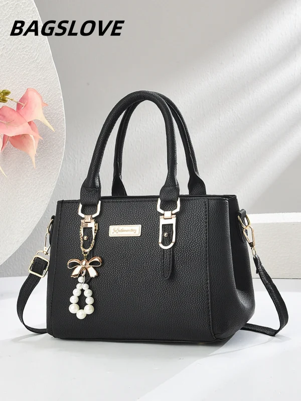Fashionable women's black handbag, fur ball accessories suitable for casual occasions, trendy suitable for daily use