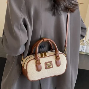Hand-carrying bowling bag female famous brand 2025 summer new retro fashion shoulder bag high-end trend all-match messenger bag