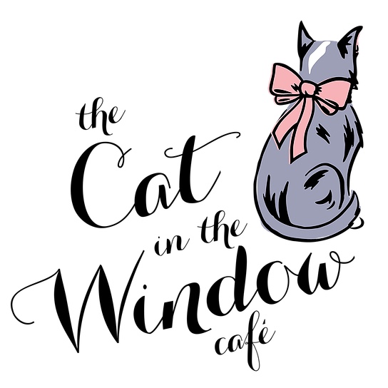 The cat in the window cafe logo