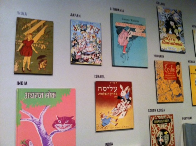 Cover illustrations of several translations of "Alice's Adventures in Wonderland."