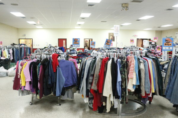 Clothing inside Catholic Charities where migrants are able to get a new pair before traveling north on bus.