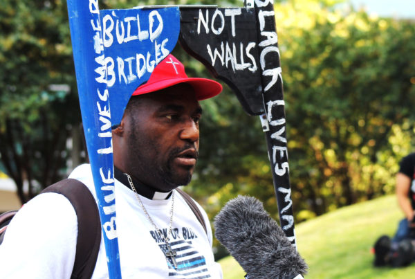 Protesters March Peacefully Through Downtown Dallas Demanding Better Policing