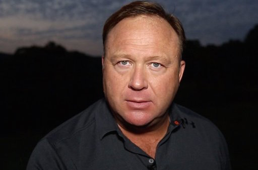 Alex Jones Says He’s No Phony, But His Lawyer Claims It’s All An Act