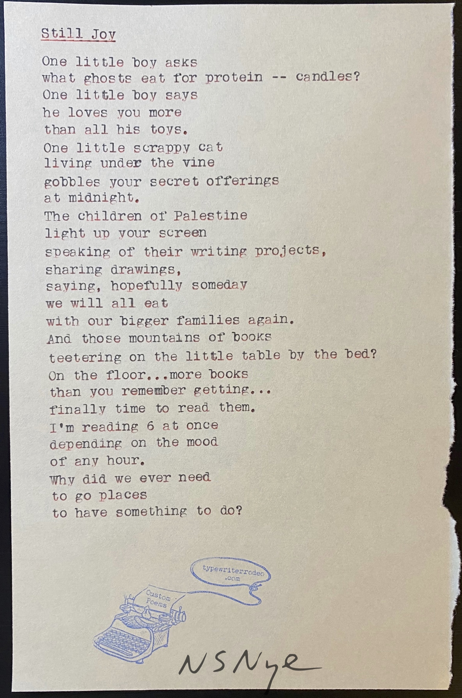 photo of typewritten poem on a small piece of partially torn paper
