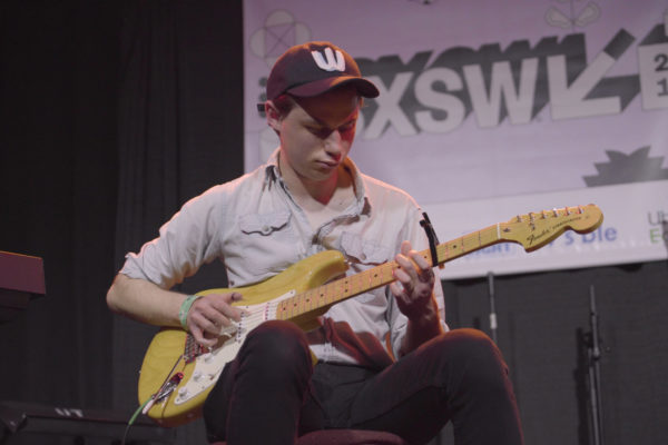 Hayden Pedigo performing at the 2019 SXSW Music Festival as depicted in the film "Kid Candidate" by Jasmine Stodel.