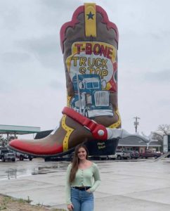 Brewer stands in front of the boot