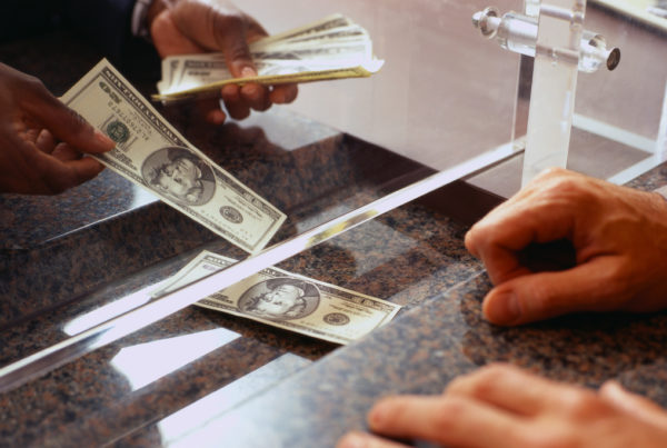Many Houston Communities Of Color Have No Bank Account. A New Federal Initiative Aims To Change That.