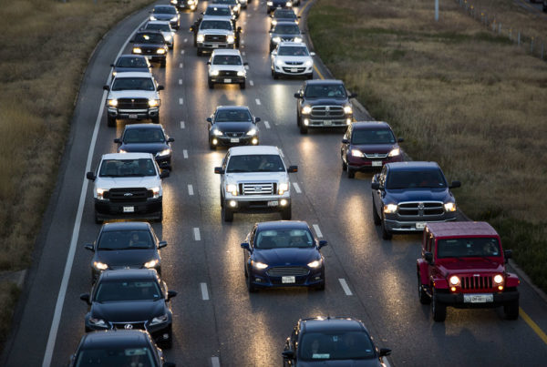 overhead view of bumper-to-bumper traffic on a highway