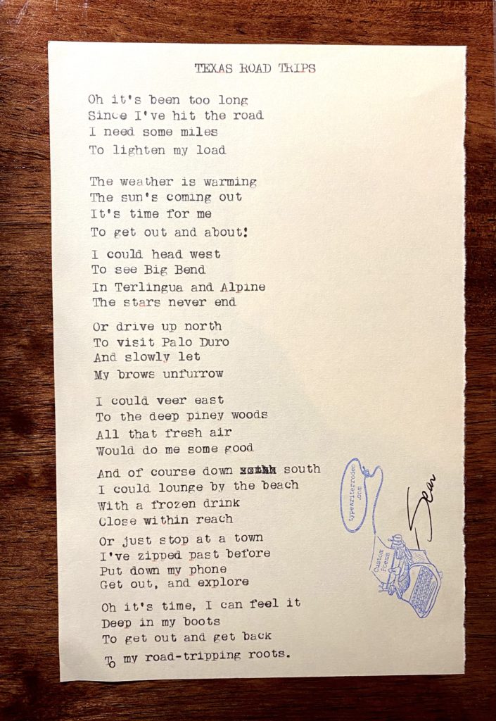 a photo of the typewritten poem on a torn piece of paper