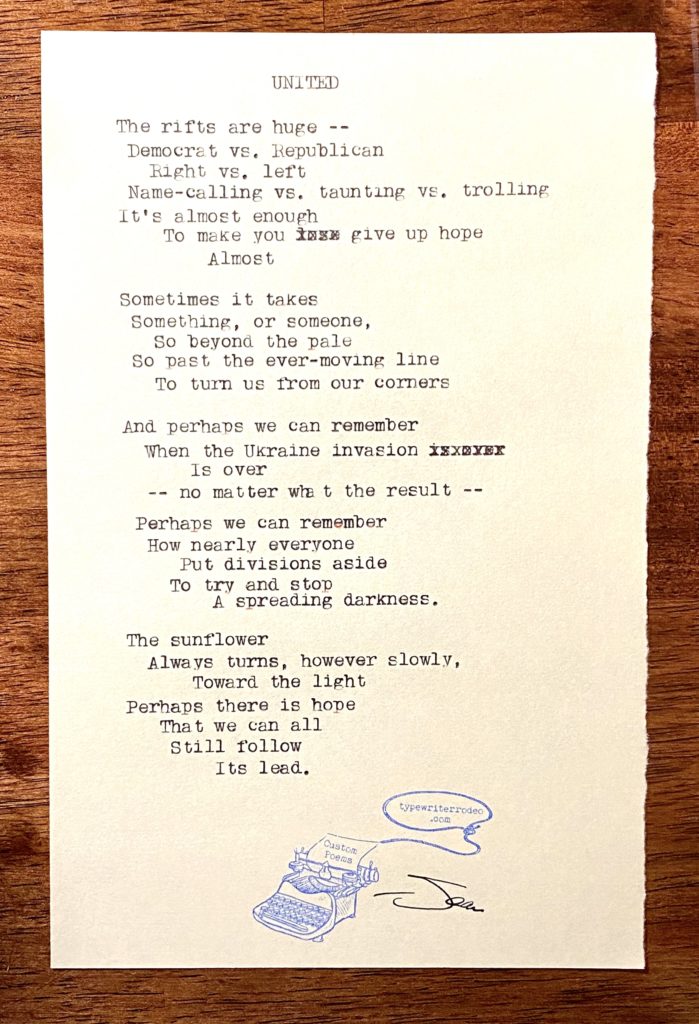 a photo of the typewritten poem on a torn piece of yellow paper