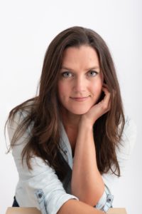a headshot of Kelcey Edwards looking at the camera