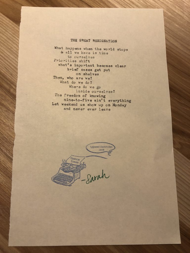 A photo of the typewritten poem on a torn half-sheet of yellow paper.
