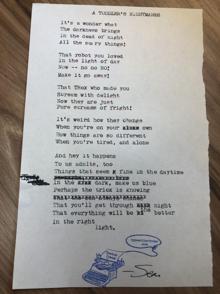 a photo of the typewritten poem on a torn half-sheet of paper