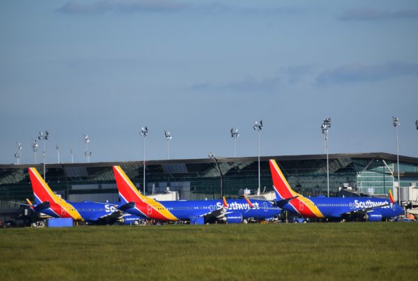 Texas airlines buffeted by ice storms and financial ones