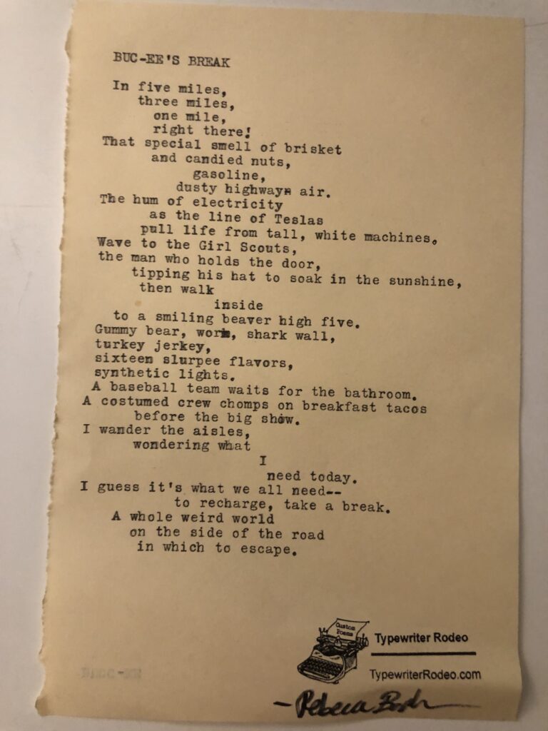 a photo of the typewritten poem on a torn half-sheet of paper