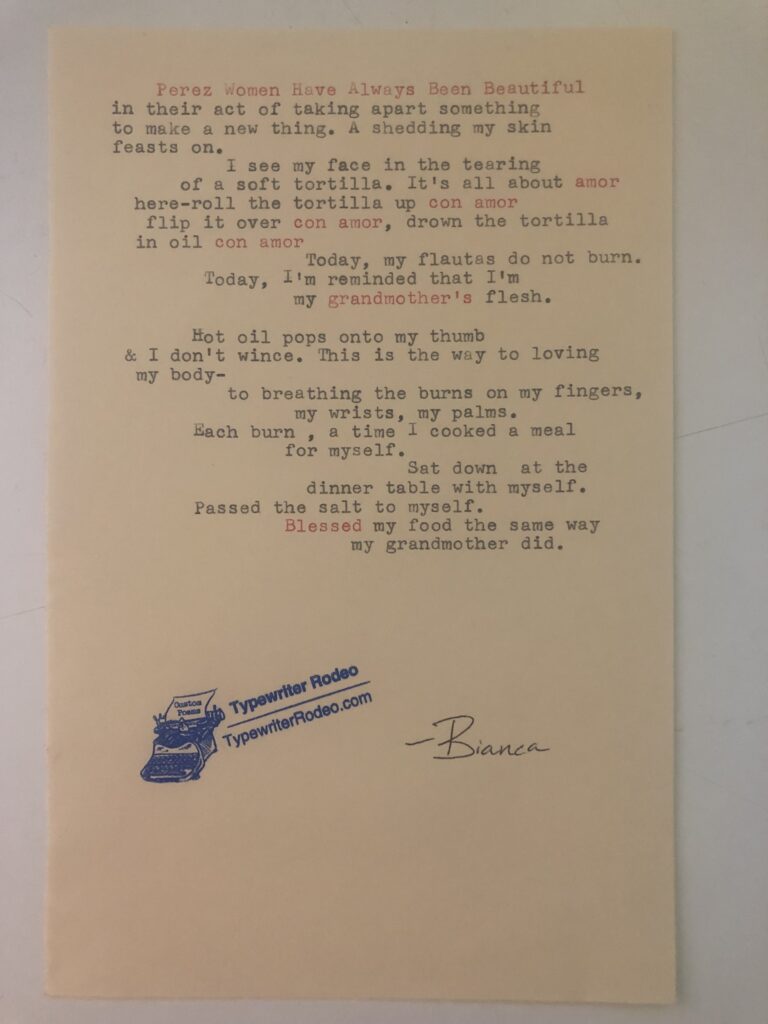 a photo of the typewritten poem on a torn half sheet of yellow paper