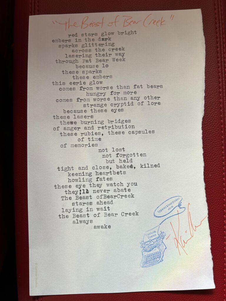 a photo of the typewritten poem on a torn half sheet of lilac paper with a soft rainbow glow.